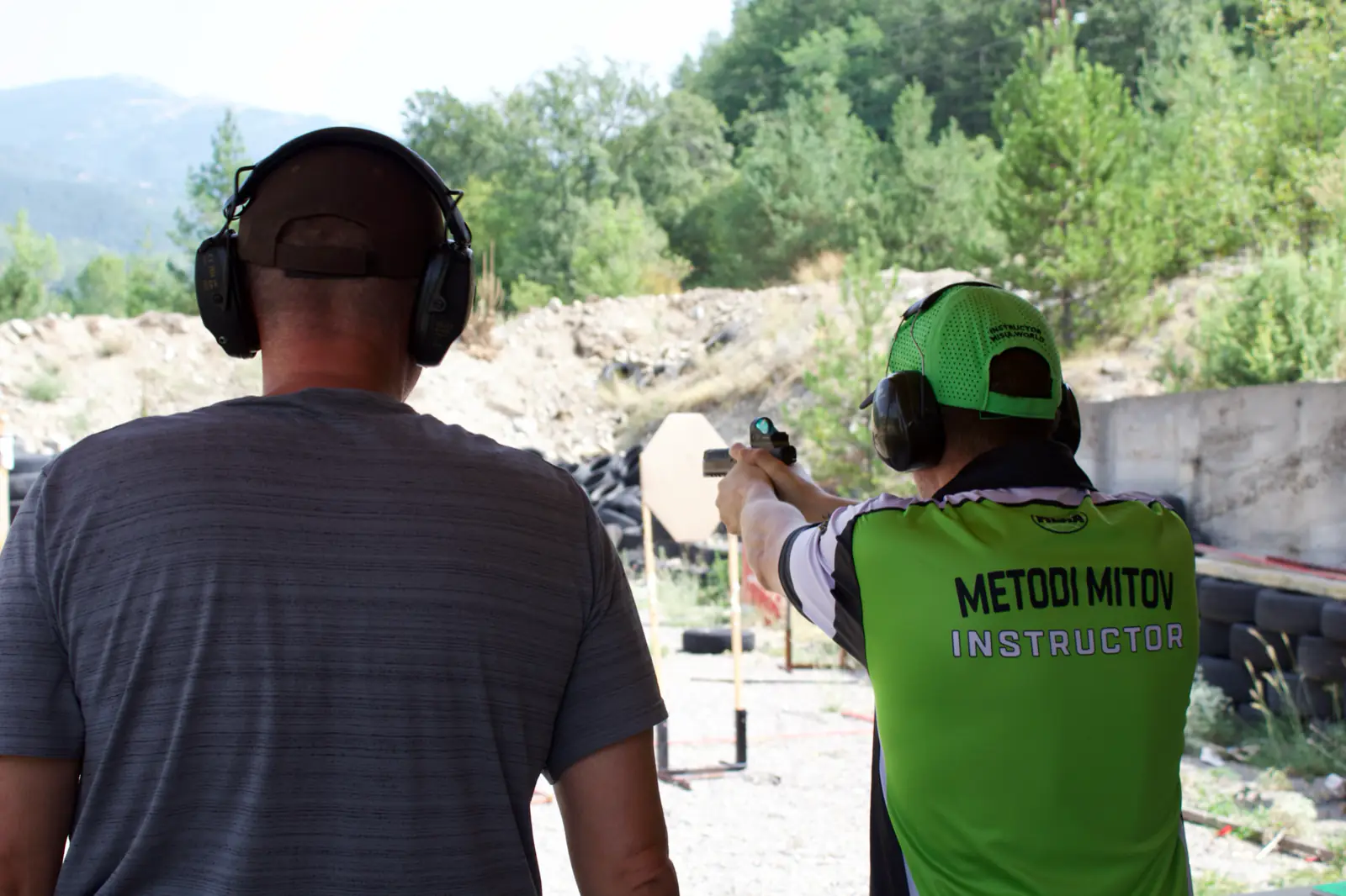 The instructor shows it first